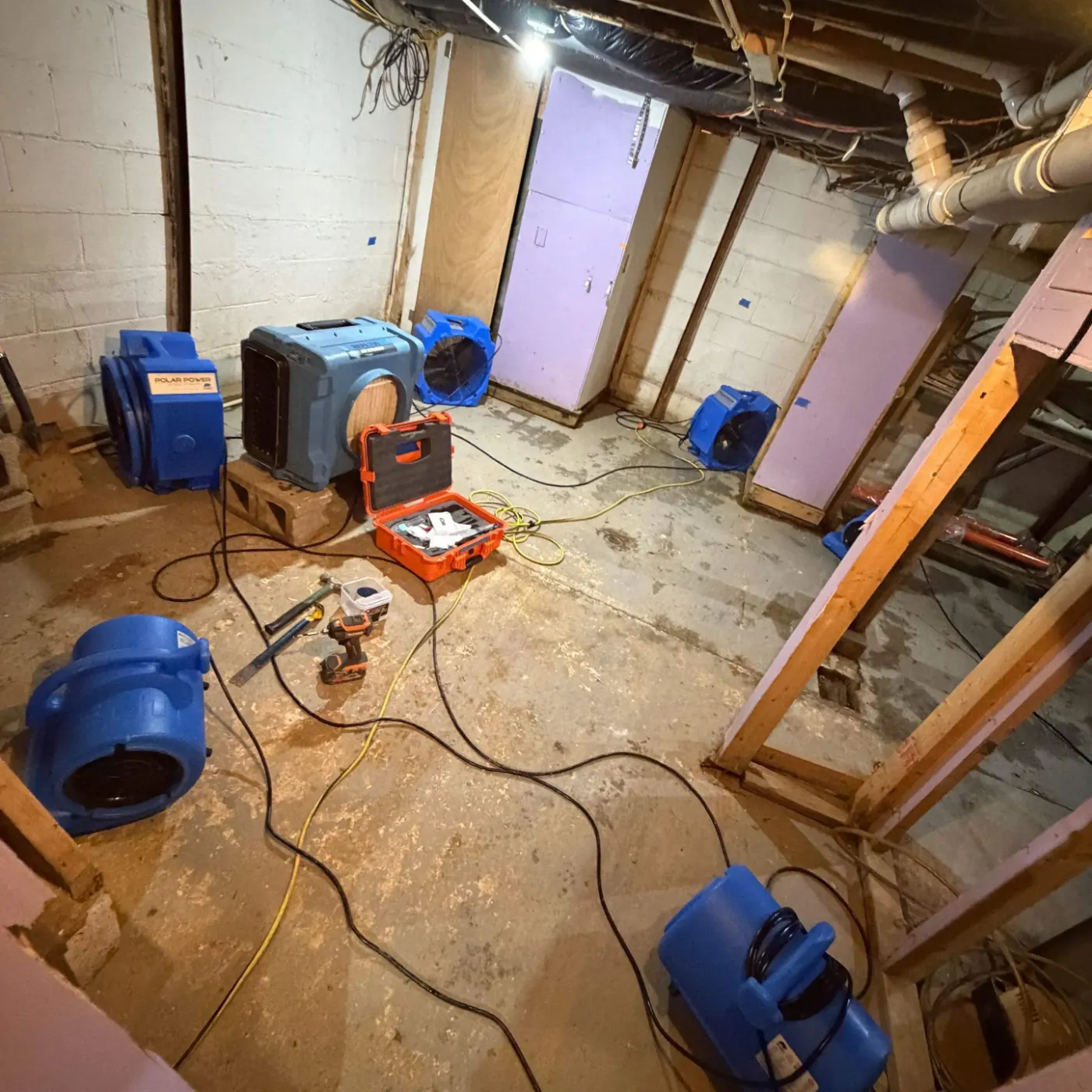 Certified restoration crew at work on Converse residence